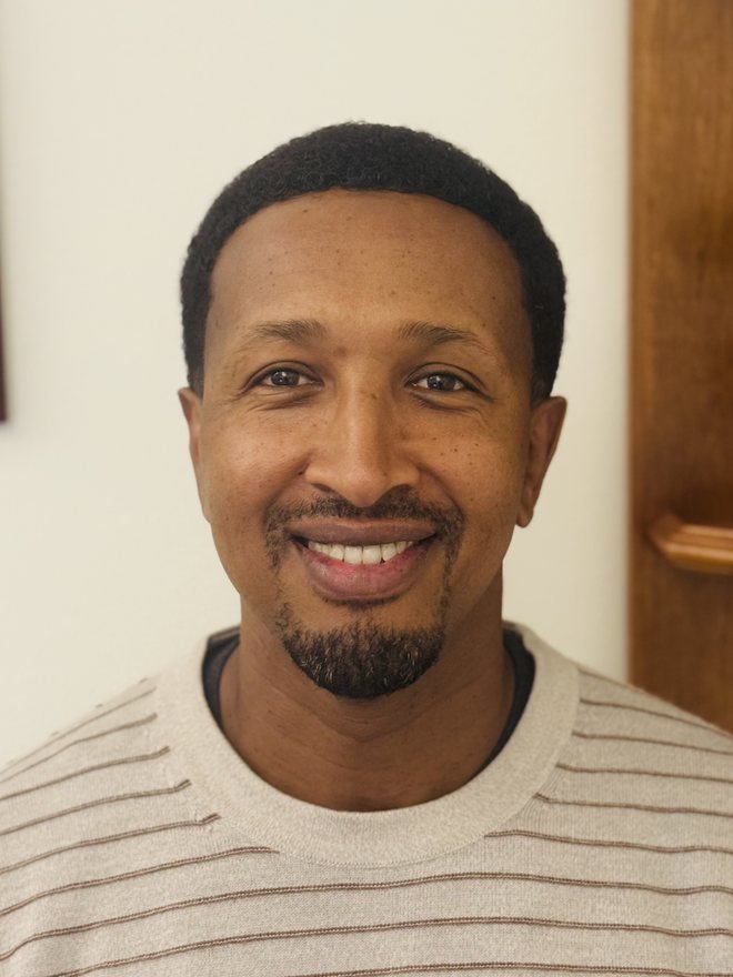 Portrait of Jamal H. Mohamed, Co-Founder and Director of Operations of New Dawn Transitions